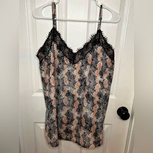 GeeGee’s top, size 2XL. 100% polyester. Pink/black snakeskin design